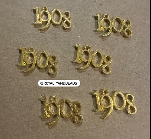Gold 1908 charm