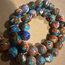Load image into Gallery viewer, Mixed orange beads.