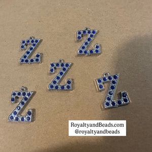 Silver Z charm.