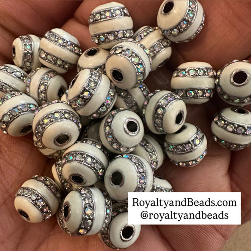 5 white rhinestone beads