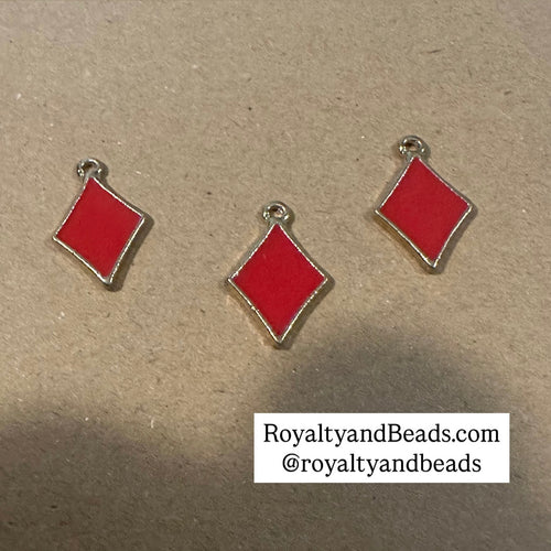 3 gold Kappa Diamond charms