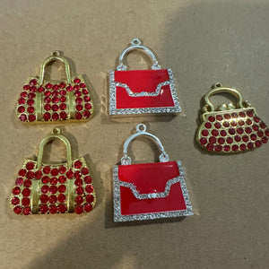 5 red purse charms