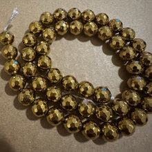 Load image into Gallery viewer, Gold hematite 8mm. (Faceted)