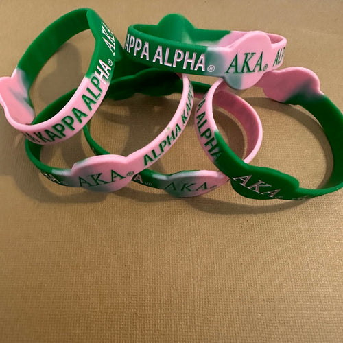 Pink and green Alpha Kappa Alpha wristband