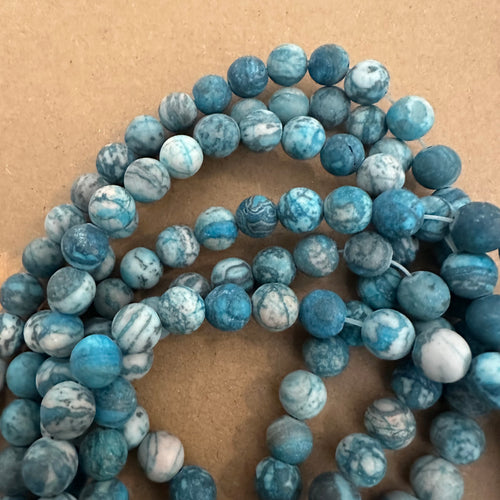 Matte blue beads and white beads