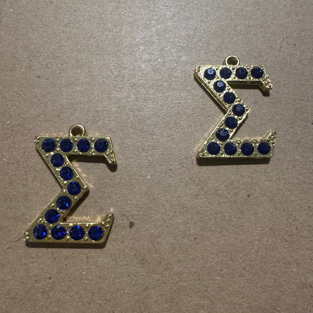 Gold Sigma charm.