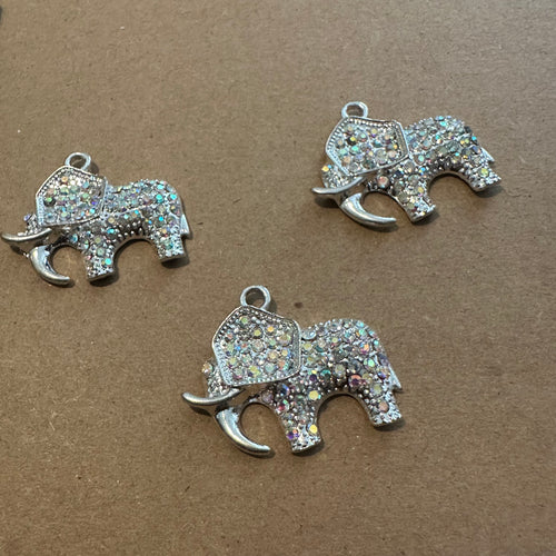 3 silver elephants
