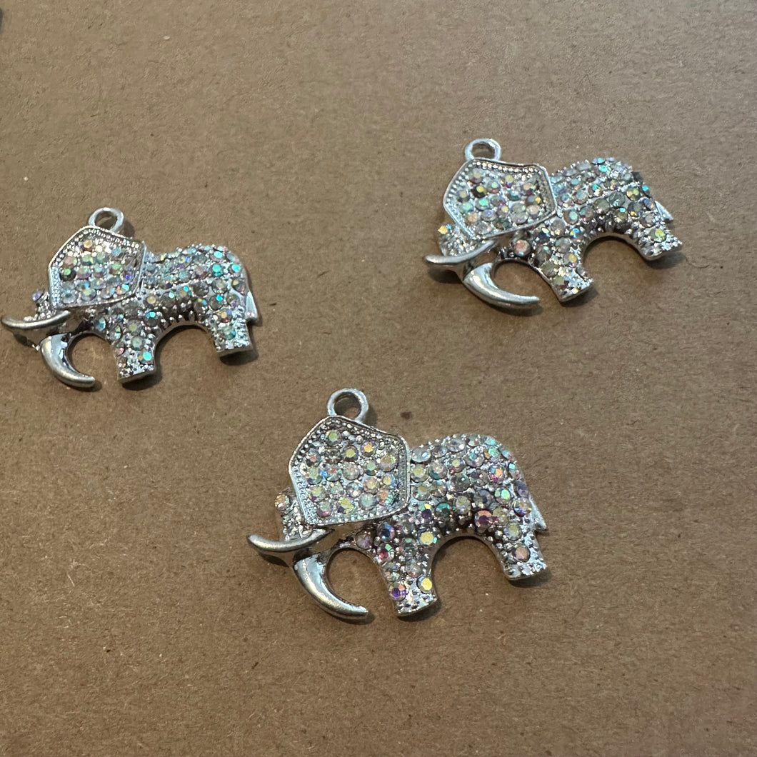 3 silver elephants