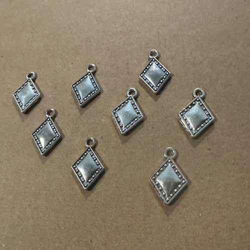 8 silver diamond charms.