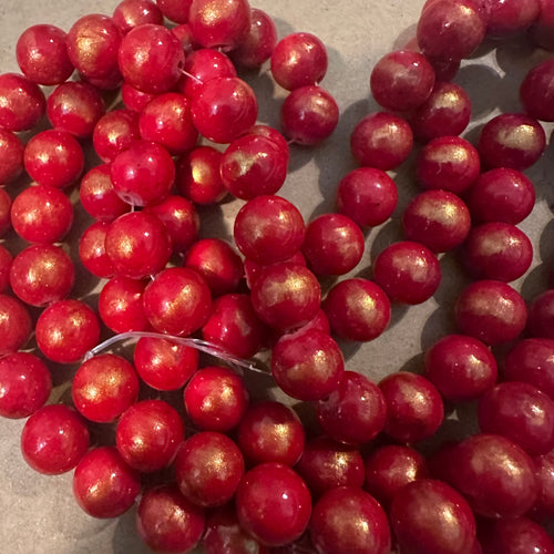 Red and gold beads*