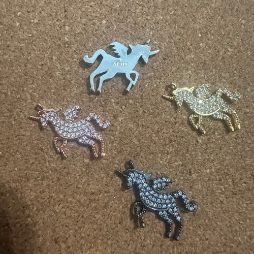 Pave unicorn charm.