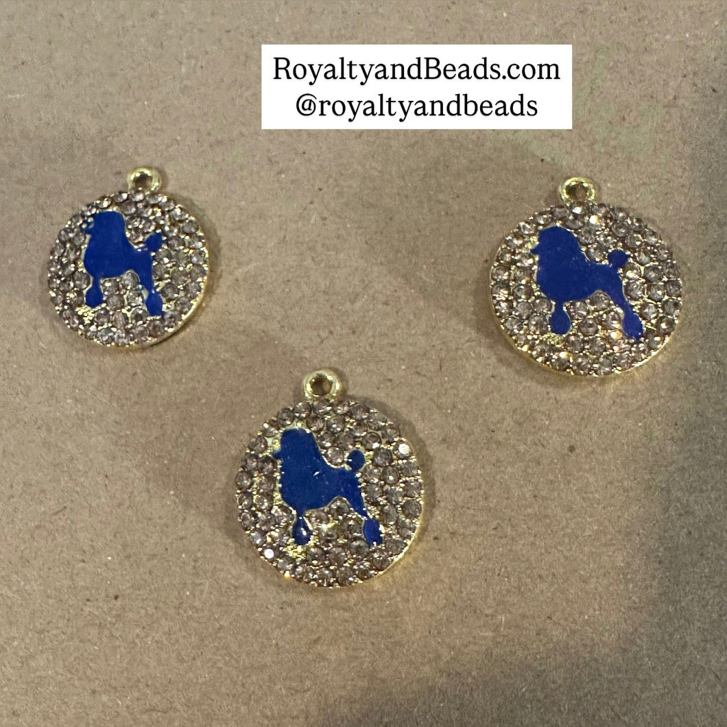 Rhinestone poodle charm.