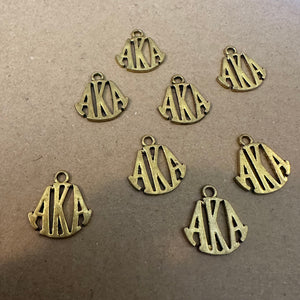 8 gold AKA charms