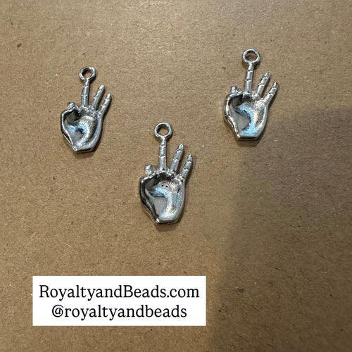 Kappa hand charm (silver).