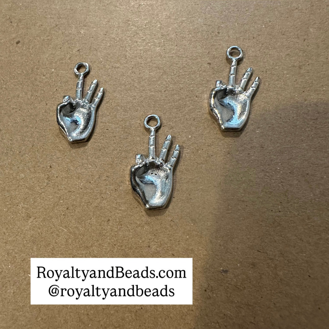 Kappa hand charm (silver).