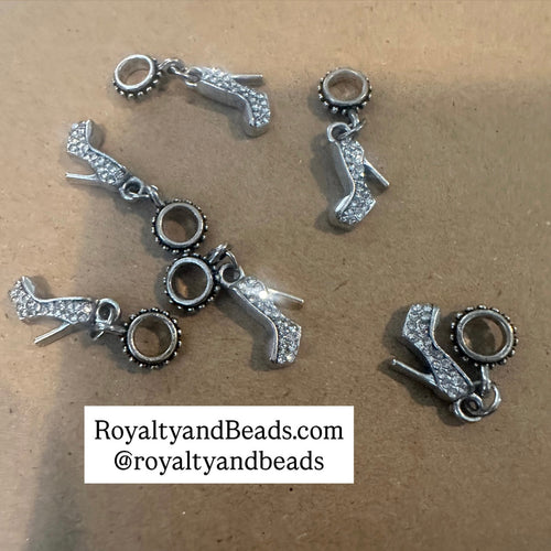 5 clear heel shoe charms.