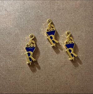 Blue and gold Rhoer charm.