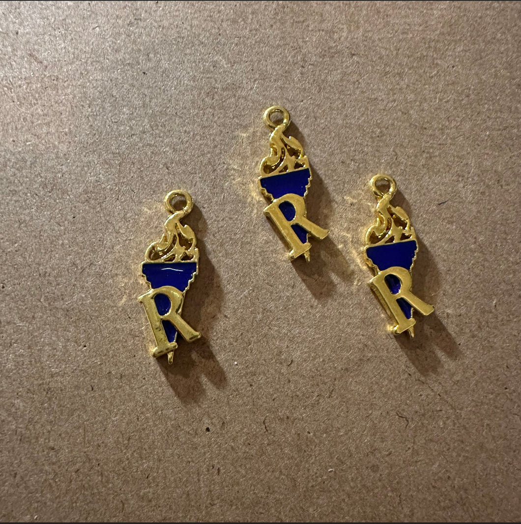 Blue and gold Rhoer charm.