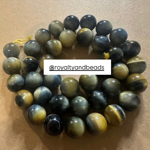 Black and gold tigers eye beads. (Round)