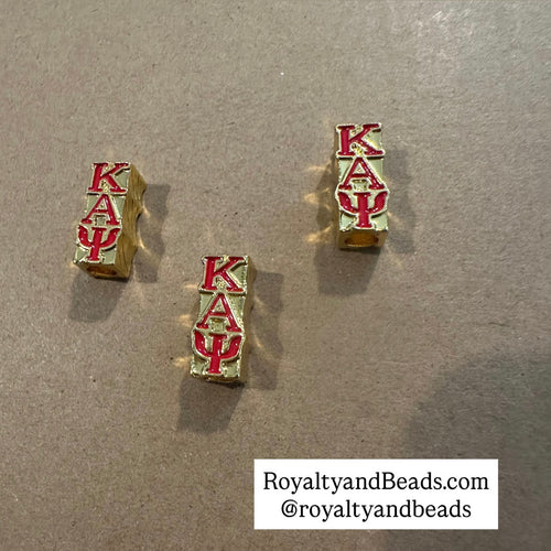 Gold Kappa Alpha Psi sliders.