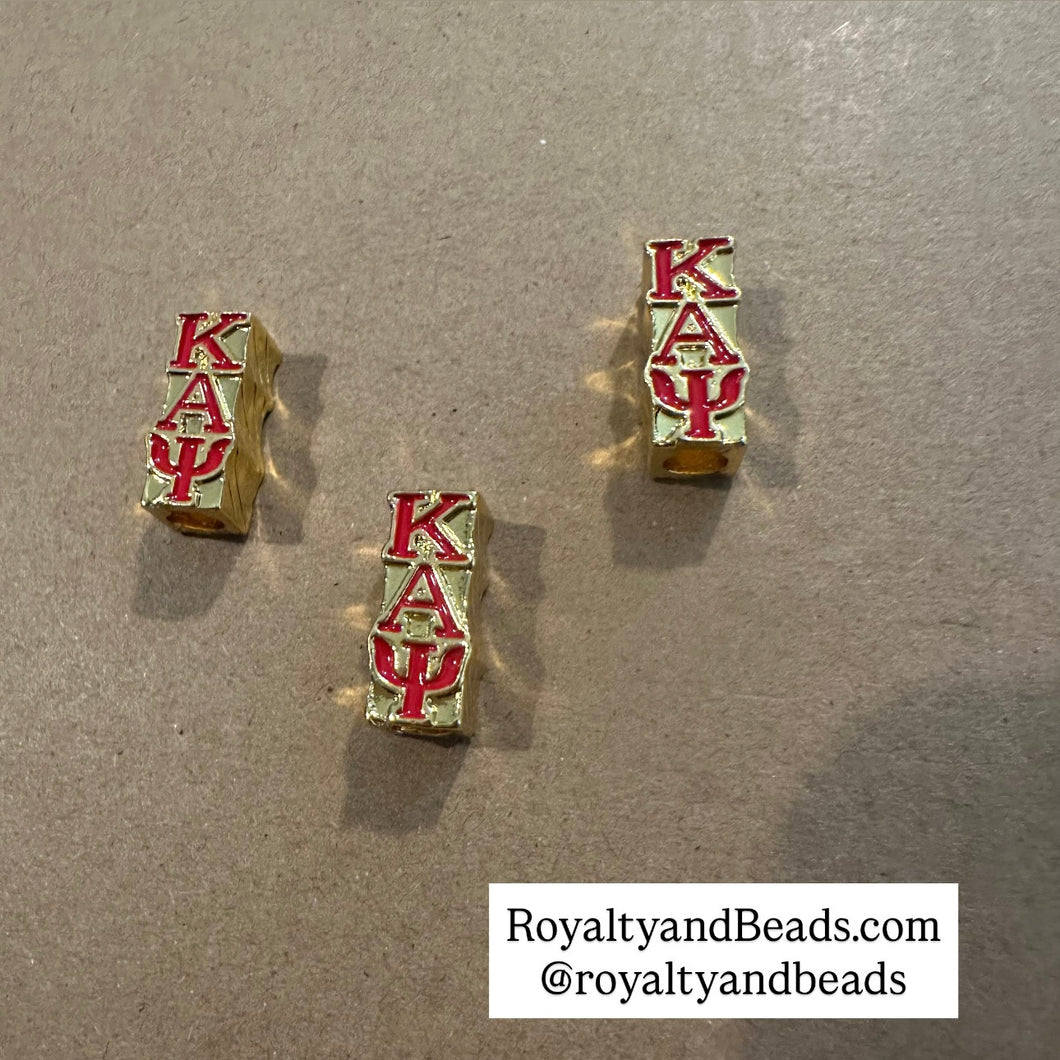 Gold Kappa Alpha Psi sliders.