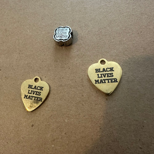 3 black charms