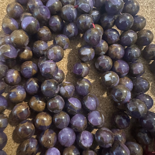 Purple and gold beads.