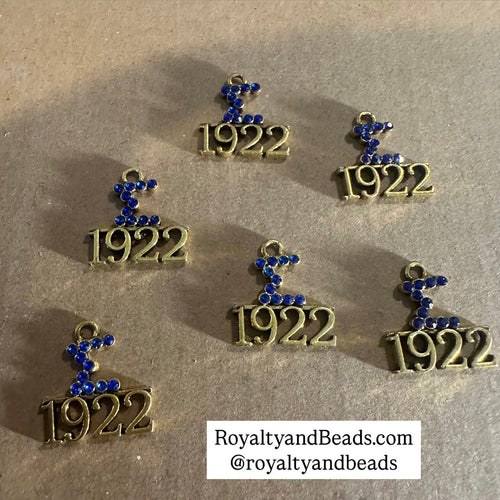 Rhinestone Sigma 1922 charm.