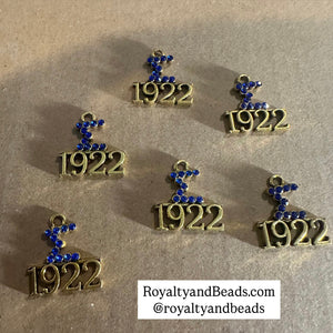 Rhinestone Sigma 1922 charm.