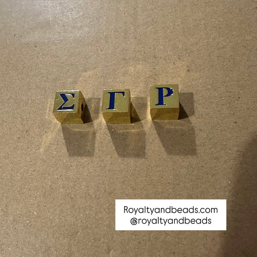 Blue and gold letter cubes (SGRho).