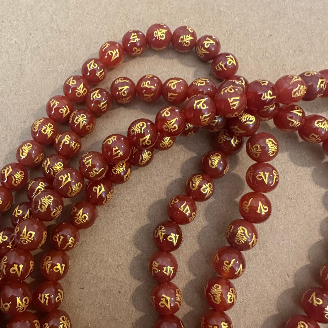 Red and gold beads