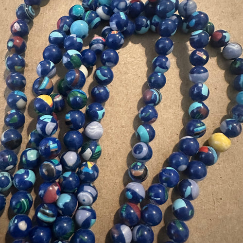 Mixed blue beads 8mm.