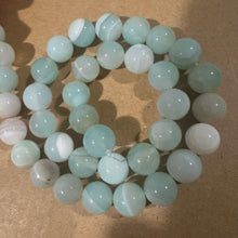 Load image into Gallery viewer, Blue agate beads.