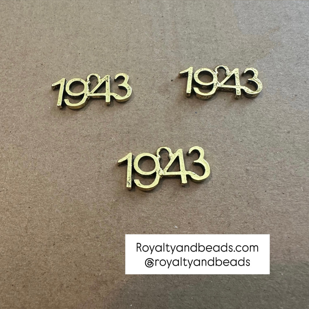 Gold 1943 Philo charm.