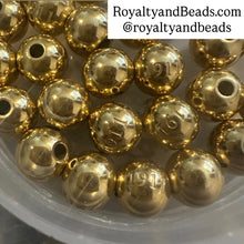 Load image into Gallery viewer, Gold 1911 beads.