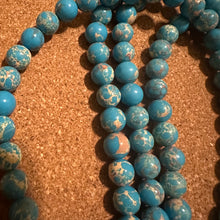 Load image into Gallery viewer, Blue and tan beads 8mm.