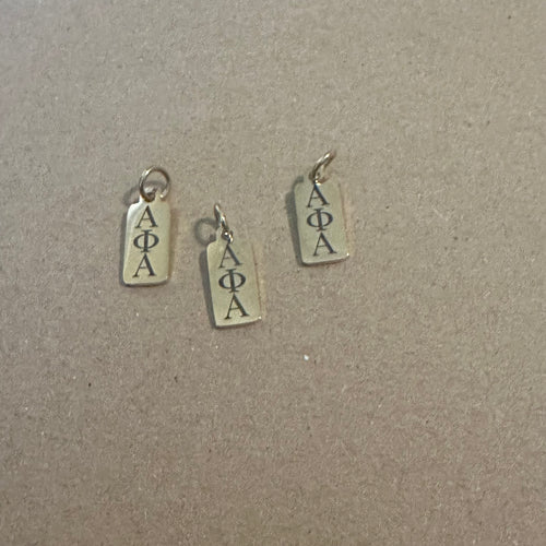 Alpha Phi Alpha tag charm.