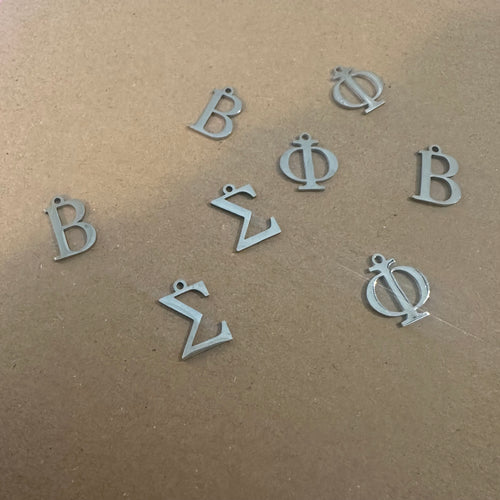 3 silver Alpha letters