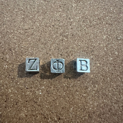 3 Zeta letter charms.