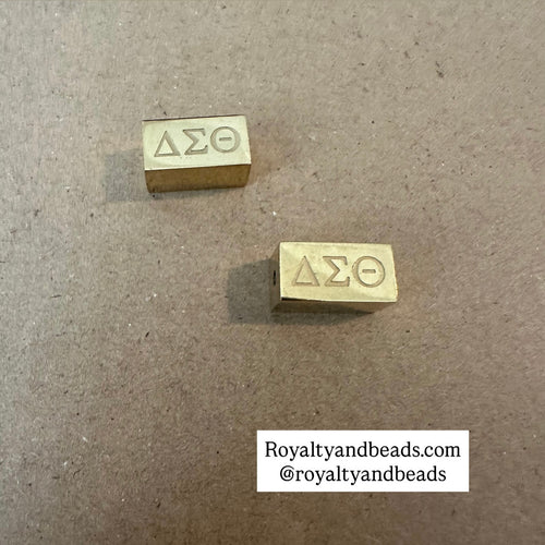 Gold Delta block charm