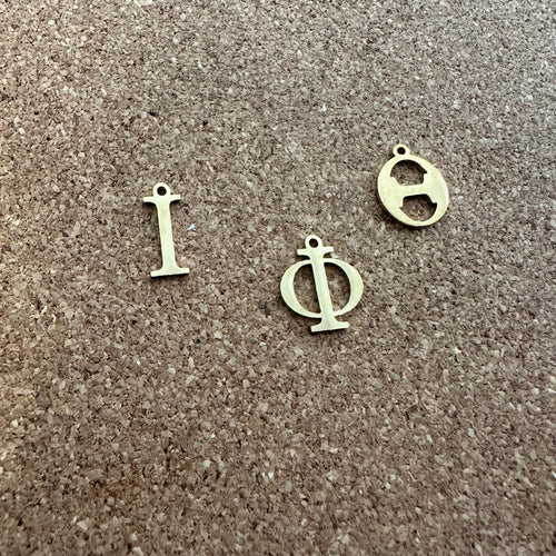 3 gold Iota letters.