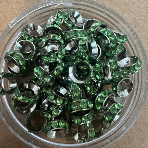 Green and silver rondelle spacers.