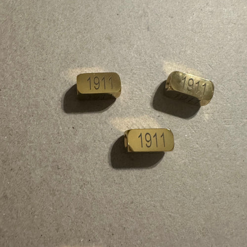Gold 1911 charm. SS