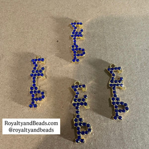 Rhinestone Sigma charm.
