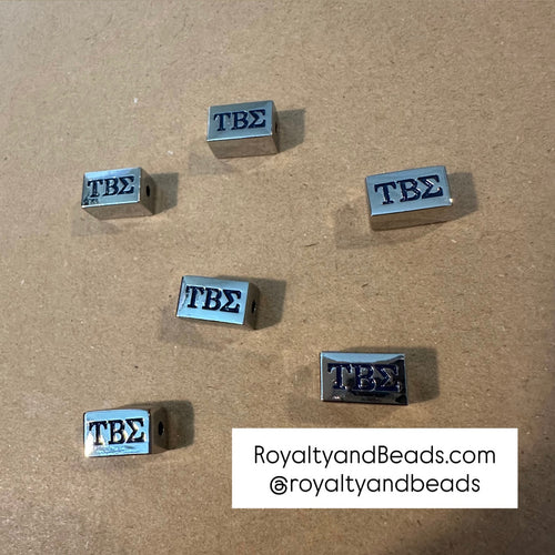 Tau Beta Sigma block charm