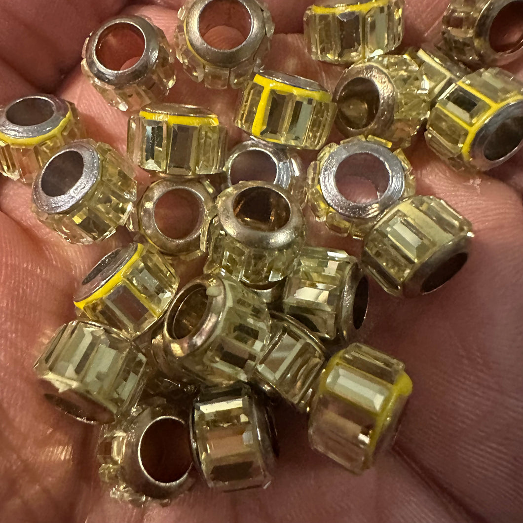 10 yellow big hole beads.