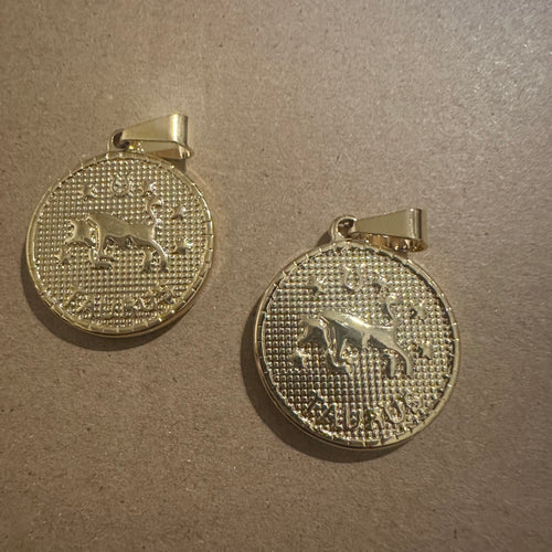 2 Taurus charms (gold)
