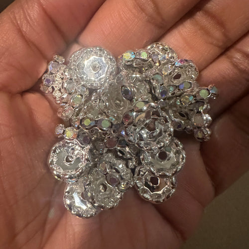 40 silver and clear rondelle spacers.