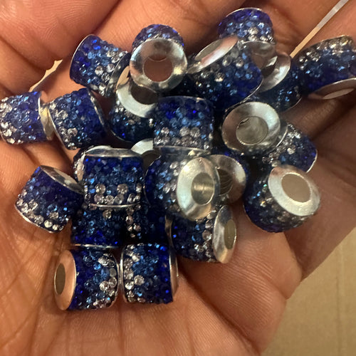 5 blue and white big hole beads.