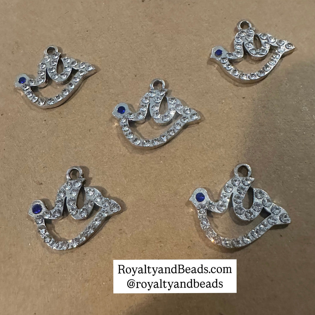 3 rhinestone dove charms.